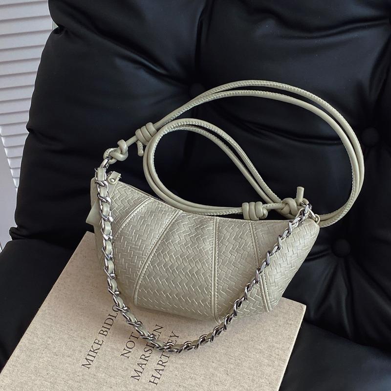 Premium texture bag women's summer new niche design messenger horn bag net versatile dumplings