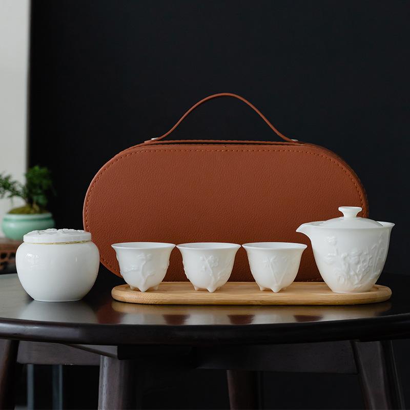 Dehua White Porcelain Mutton Fat Jade Plain Firing Relief Outdoor Travel Tea Set One Pot Three Cups of Fast Guest Cup Business Gifts