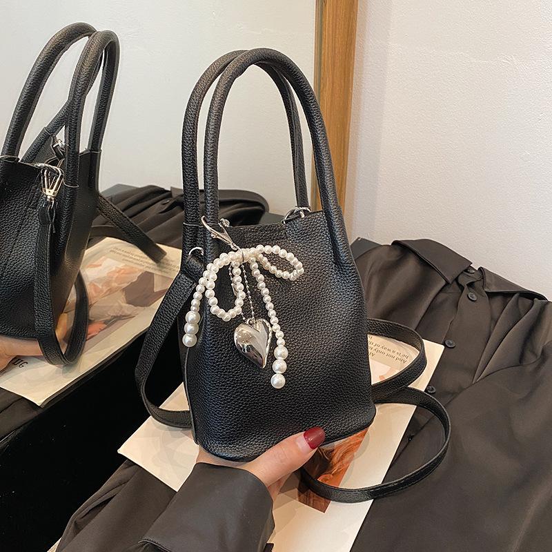 2025 New Sweet Bow Handbag Bag Female Senmeng Korean Version Chain Bucket Bag Messenger Bag Dinner Bag