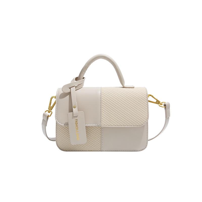 2025 new contrasting color retro portable small square bag female Sen Meng fashionable texture shoulder bag personalized commuter messenger bag