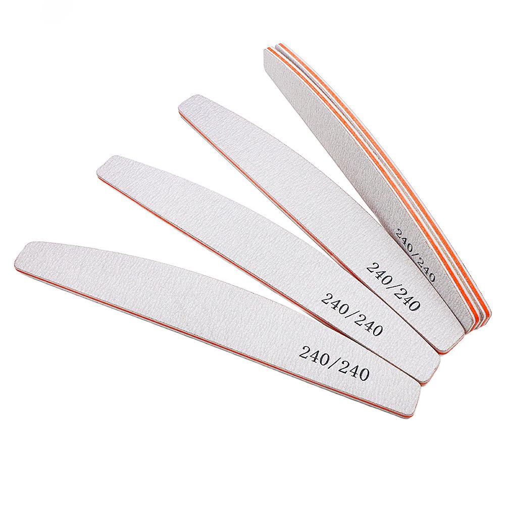 

Серо-белая пилка-полумесяц для ногтей, износостойкая, моющаяся, не осыпающаяся, двухсторонняя шлифовальная полоса с зубцами.