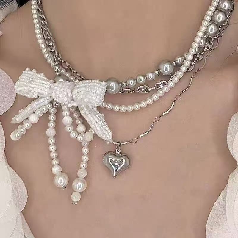 Wind silver love beaded necklace niche design girl retro high sense versatile collarbone neck chain