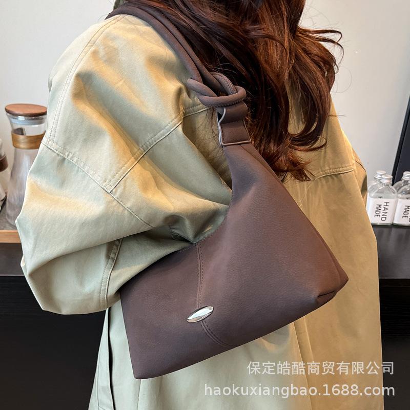 High-end niche bag women's autumn and winter retro 2025 new fashion shoulder messenger bag popular portable dumpling bag