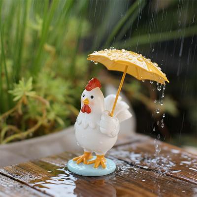Figurina di Pollo con Ombrello Giallo Statuetta di Pulcino Cartone Animato Statua in Resina Scultura Ornamento Decorazione Scrivania Casa Ufficio