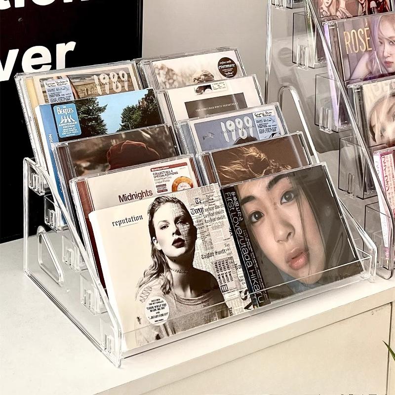 Vitrína na CD Domácí akrylový stojan na CD Albumy Úložný box na CD Úložný stojan na časopisy Albumy slavných zpěváků CD
