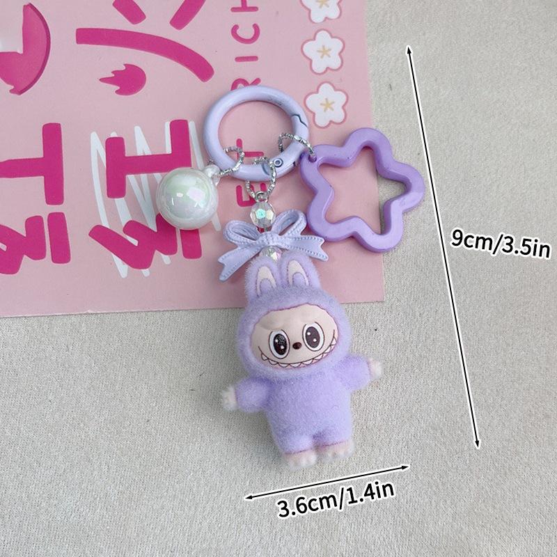 

Милый флокированный брелок, маленький кулон в виде куклы, модный, игровой, студенческий, для пары, аксессуары для подвешивания на сумку 1pc