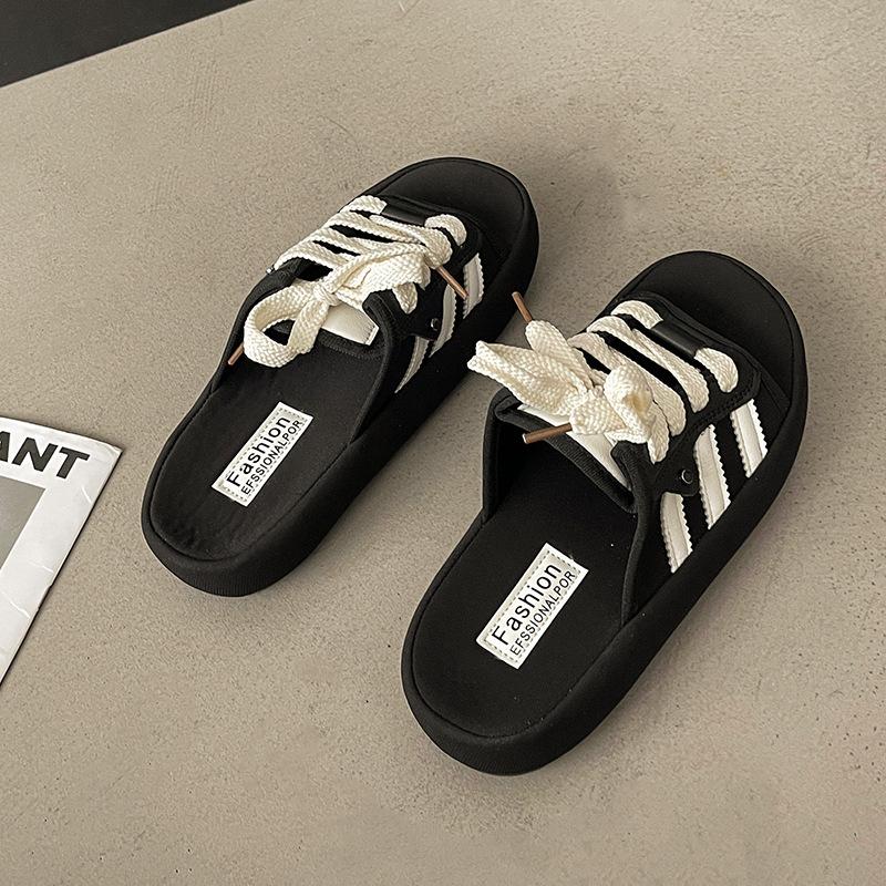 

Premium shit-stepping thick-soled slippers for women s summer wear 2025 new casual seaside beach one-word cool slippers 40