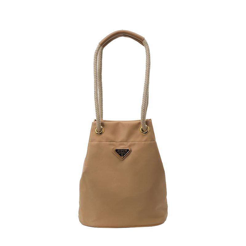 Versatile New Triangular Standard Nylon Canvas Bag Mini Niche Bucket Bag Double Chain Drawstring Single Shoulder Handbag Women