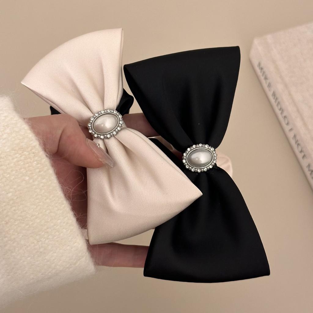 A Tall and Elegant Bow Tie, Hair Band, Headwear, High Elastic Hair Tie, and A Hair Tie At The Back of The Head