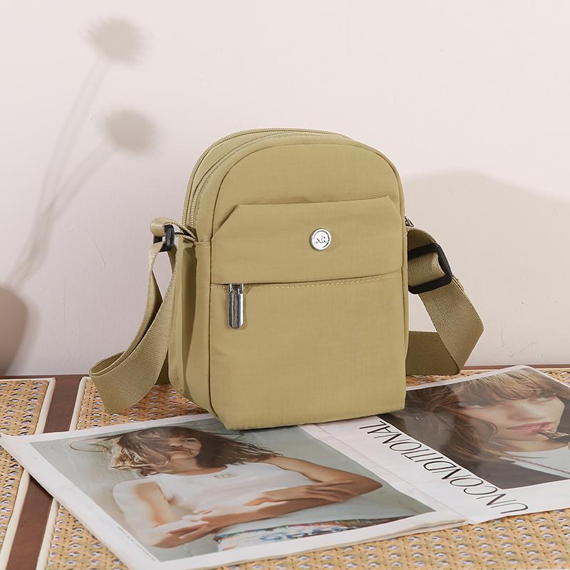 Lightweight Nylon Crossbody Bag with Front Flap Snap Closure Casual Mini Shoulder Purse for Daily Travel