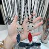 Elegant Cat's Eye Fox Pendant Necklace: Autumn/Winter Stylish Sweater Chain for Women