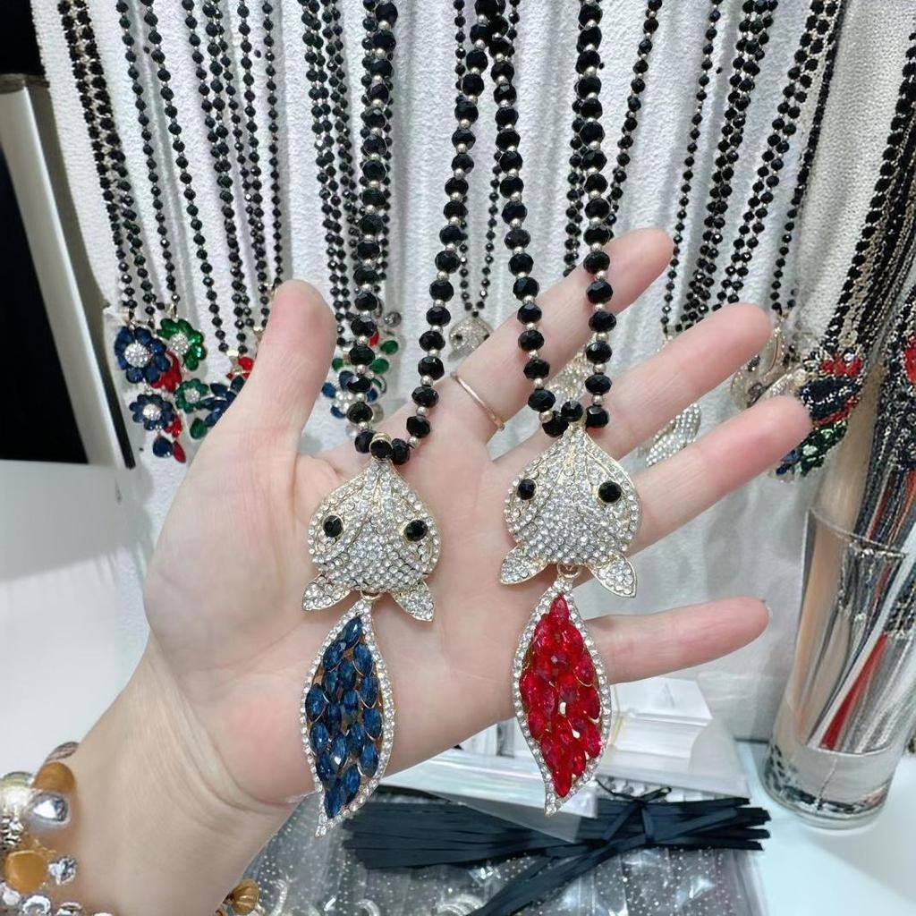 Elegant Cat's Eye Fox Pendant Necklace: Autumn/Winter Stylish Sweater Chain for Women