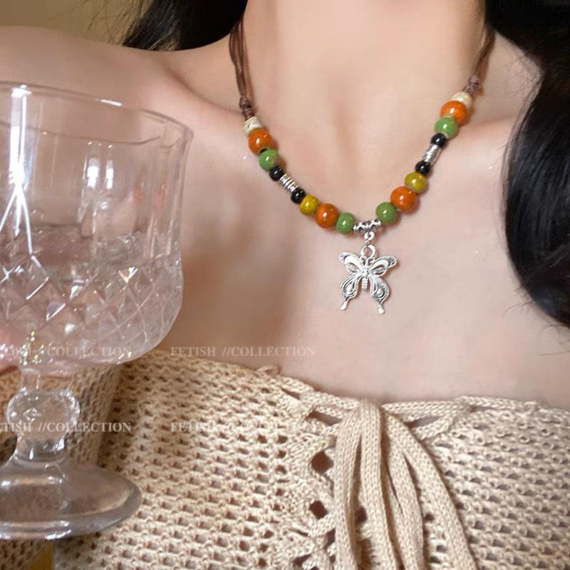 Bohemian Ethnic Style Long Bow Metal Necklace with Vintage Distressed Pendant (2025)