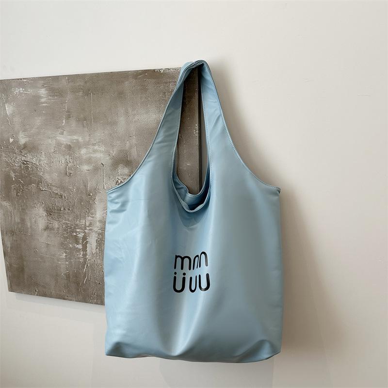 

Casual fashion large-capacity bag women s 2025 new fashion commuter shoulder bag college student class bag tote bag синій