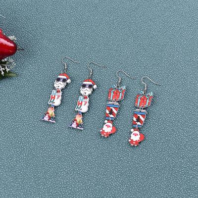 Świąteczne kolczyki transgraniczne: Piernikowy Ludzik i Bałwan, Urocze Brokatowe Drzewka, Kapelusze i Dzwoneczki