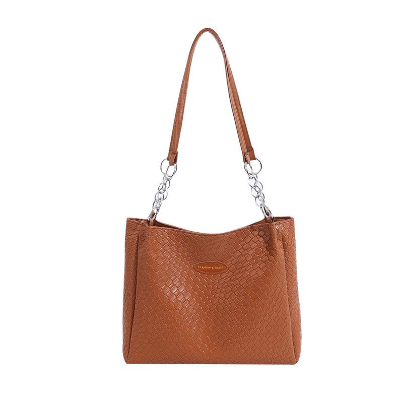 

Soft leather large-capacity fashion woven pattern handbag women s 2024 spring and summer niche commuting texture shoulder tote bag коричневий