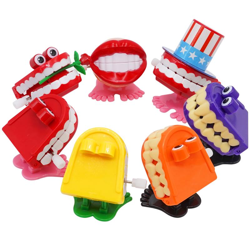 5Pcs Children Gifts Tooth Shape Mini Clockwork Jumping Toy Funny Cute Jump Teeth Denture Educational Toys Spring Wind Up Toy