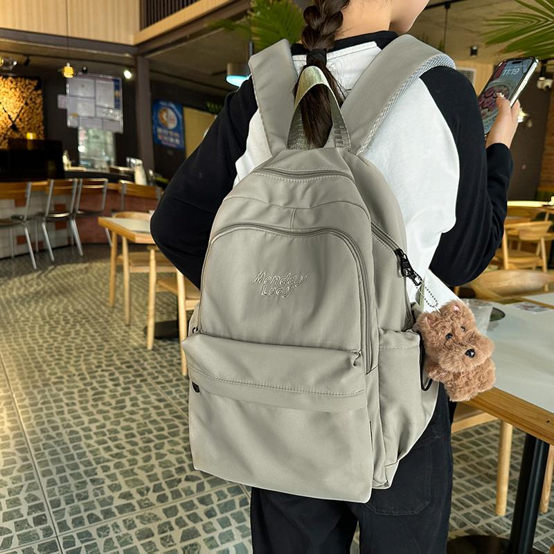 Jednobarevný školní batoh pro studenty nižší střední školy s velkou kapacitou, dámský batoh s výšivkou písmen