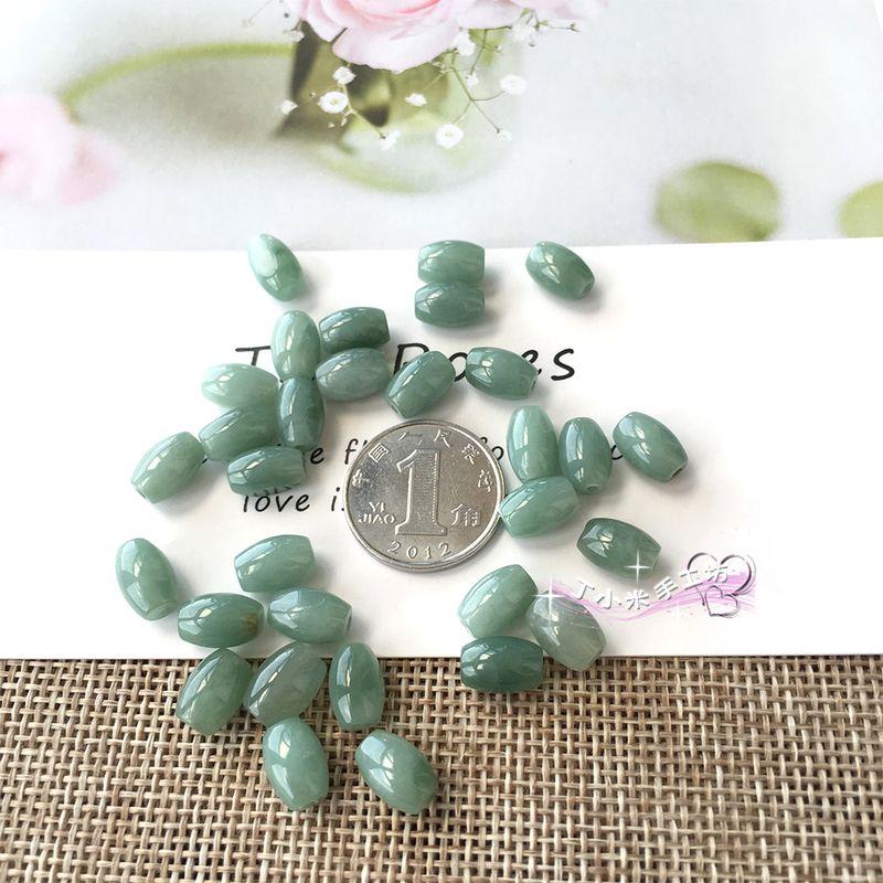 

Myanmar Loose Jade Beads a Goods Corn Beads round Beads Olive Beads Topaz Oil Green DIY Bracelet Wrist Chain Accessories New Oil green jade rice beads 9*6mm(1)