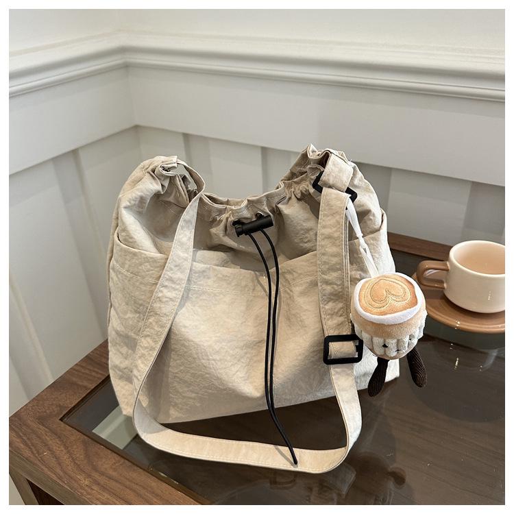 Large Waterproof Nylon Drawstring Shoulder Bucket Bag for Travel & Casual Use