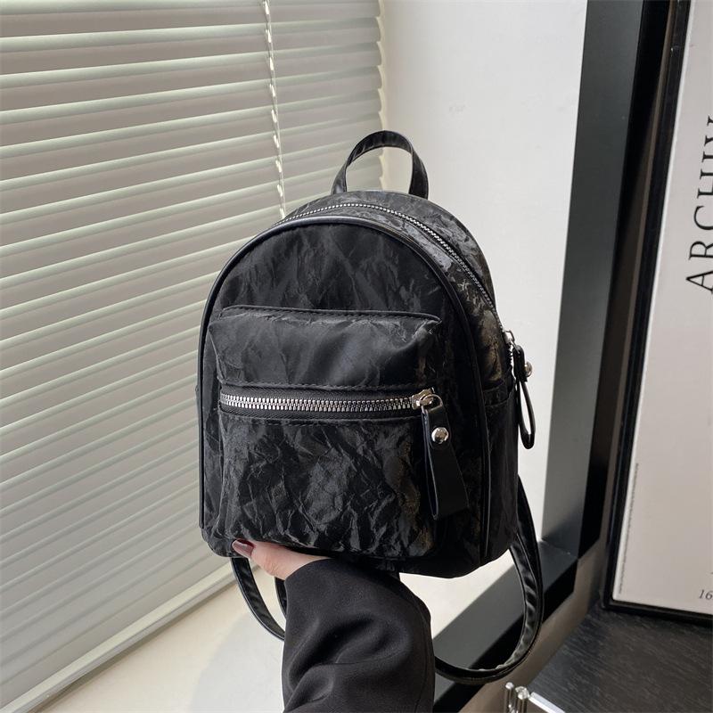 Schoolbag Korean version of simple small bag women's 1011 fashion new small backpack casual simple texture commuter travel backpack