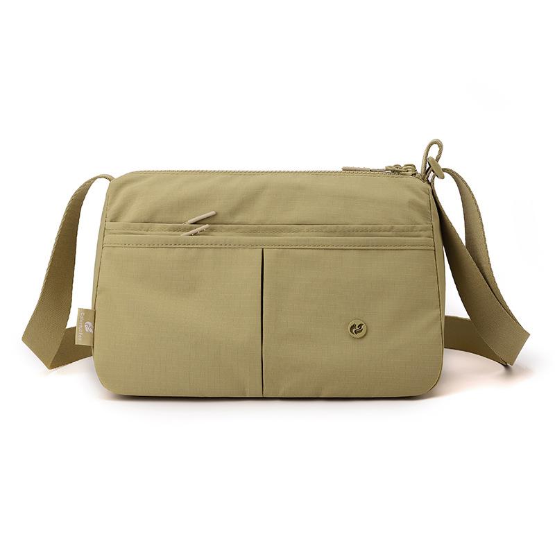 Borsa a tracolla sottile con tasche frontali e tracolla regolabile in nylon tinta unita
