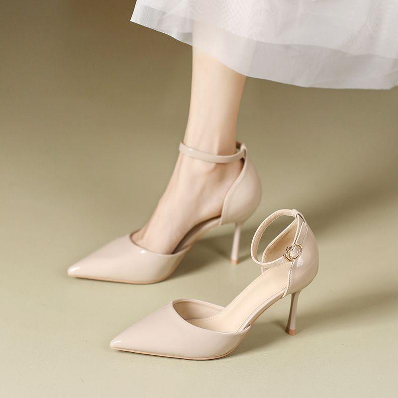 Fashion versatile temperament one-word buckle with high heels 2025 summer new pointed head shallow mouth thin heel hollow sandals women