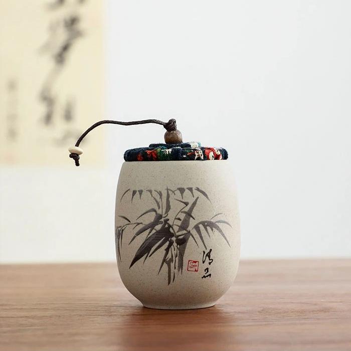 Portable Sealed Ceramic Tea Jar – Pottery Storage Canister with Plum, Orchid, Bamboo & Chrysanthemum Design