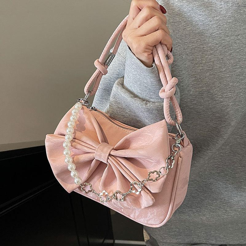 Spring and summer hot sale French niche design bow underarm small bag women's casual high-end texture foreign-style messenger bag