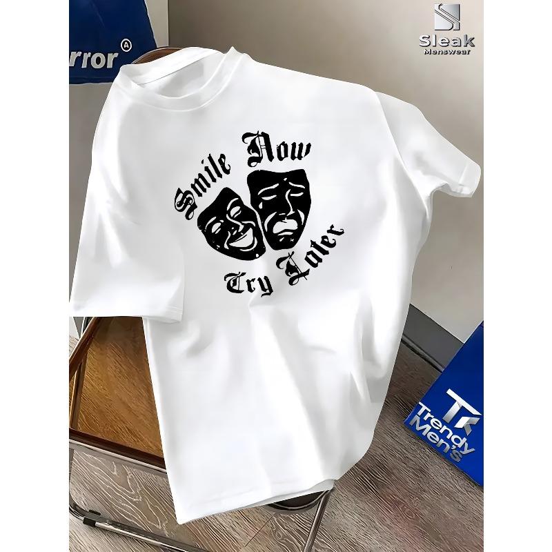 European Size Combining with a Street Dark Vibe, The "Smile Now Cry Later" Lettered Short-Sleeve T-Shirt Featuring a Dramatic Mask Print