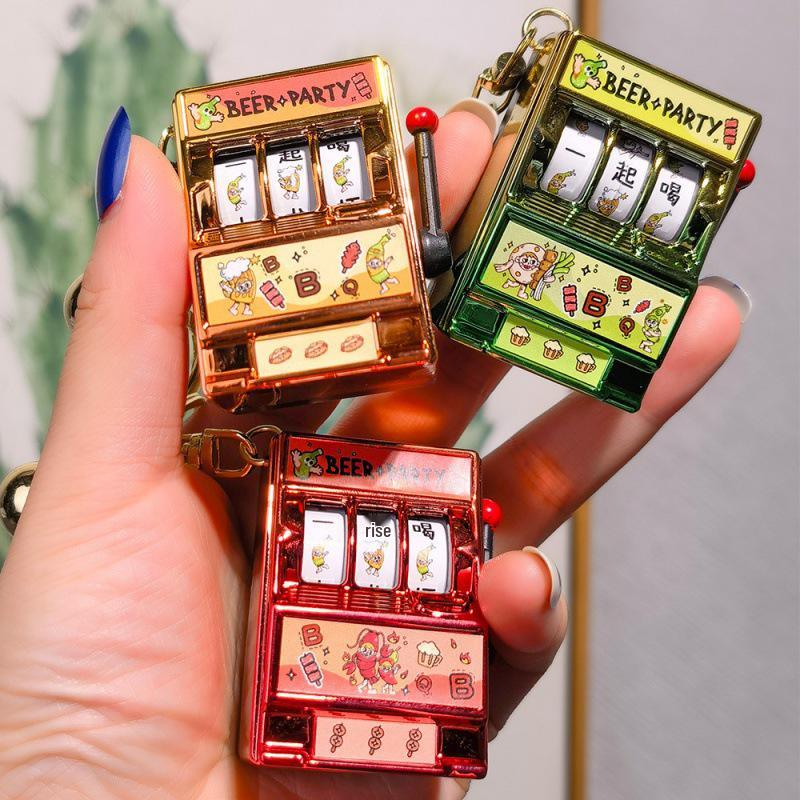 Mini Cartoon Fruit Slot Machine Keychain: Playable, Spinning, Rocking Toy Game