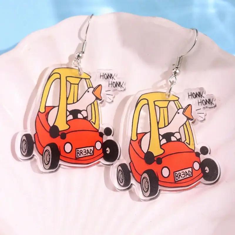 Cross-border new funny duck driving car earrings flat acrylic quirky cartoon white goose earrings