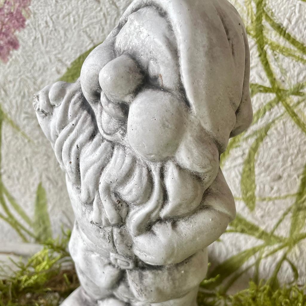 Decorative sculpture gray concrete dwarf figure