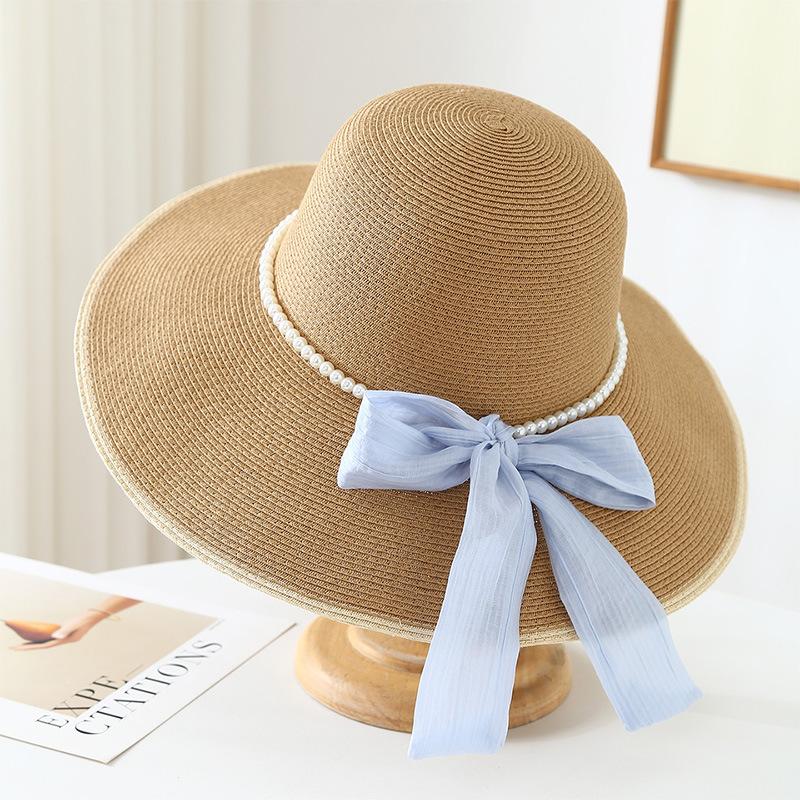 New pearl chain bow straw hat women's spring and summer big brim outdoor sunscreen hat vacation style travel sun hat