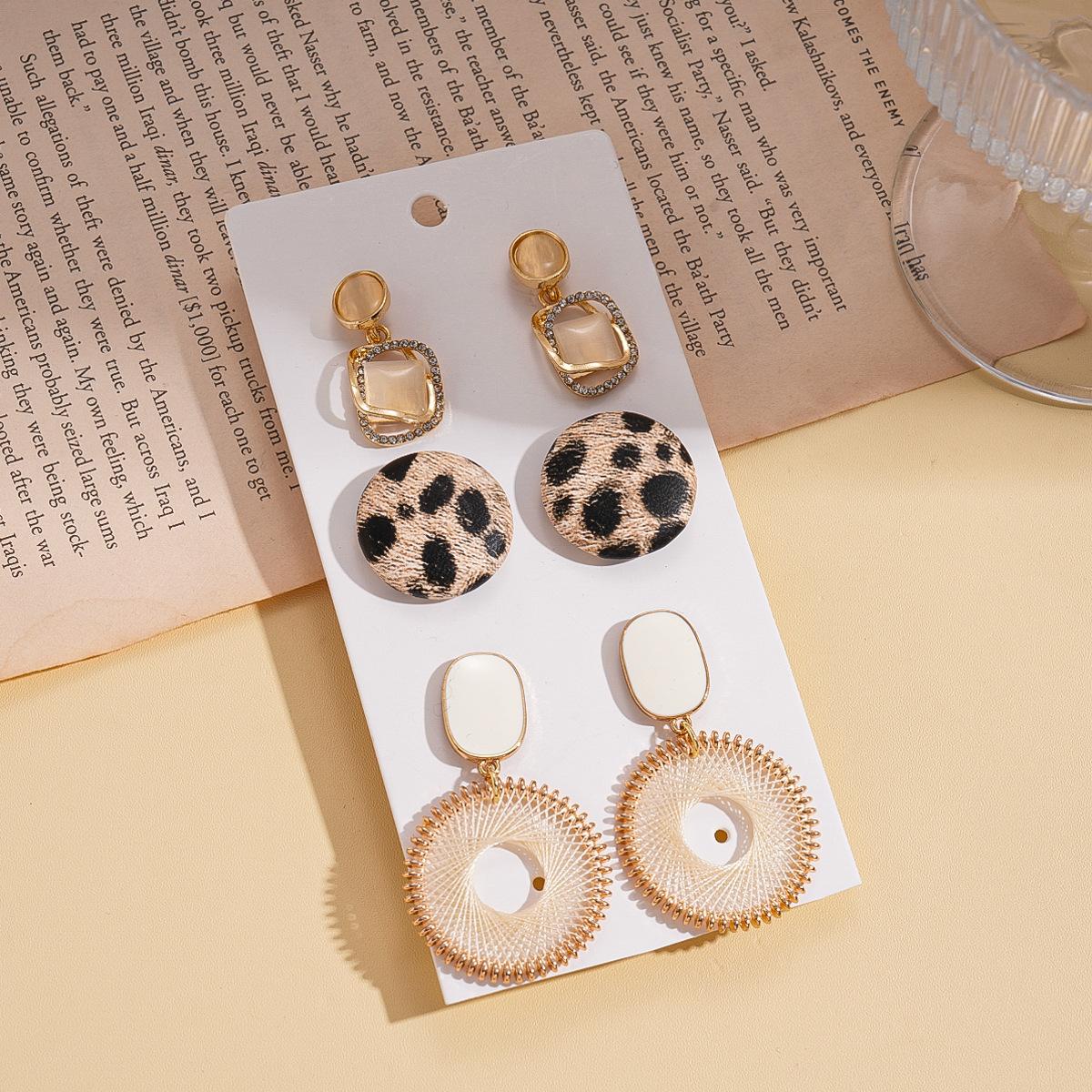 

Six-piece set of diamond-encrusted resin leather drip oil round silver needle earrings vacation style earrings