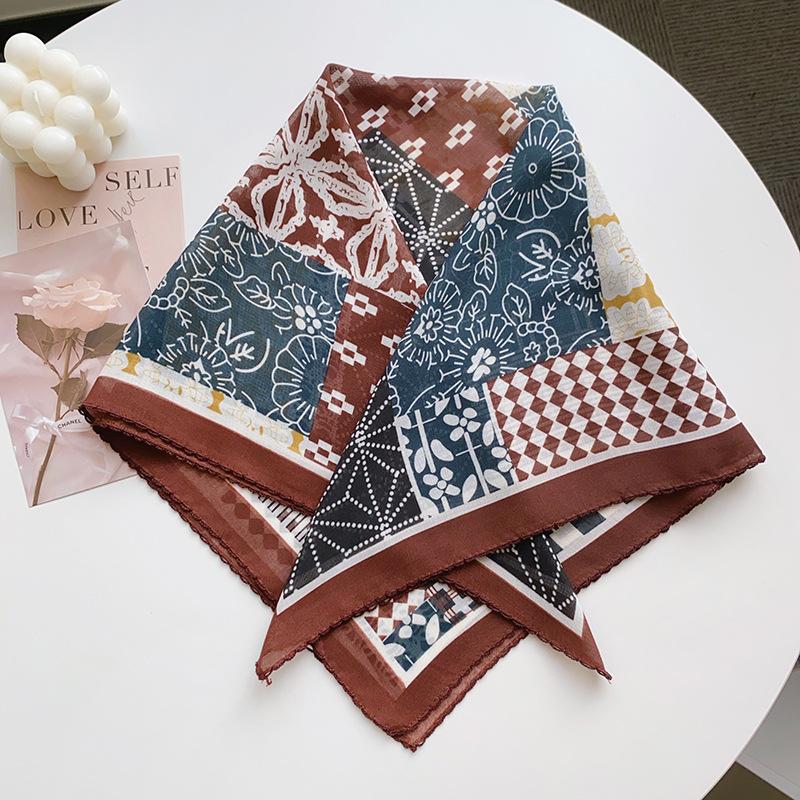 Creative design with a simple color-blocked Bali yarn curved edged square scarf, high-end sun protection, lightweight travel photography paired