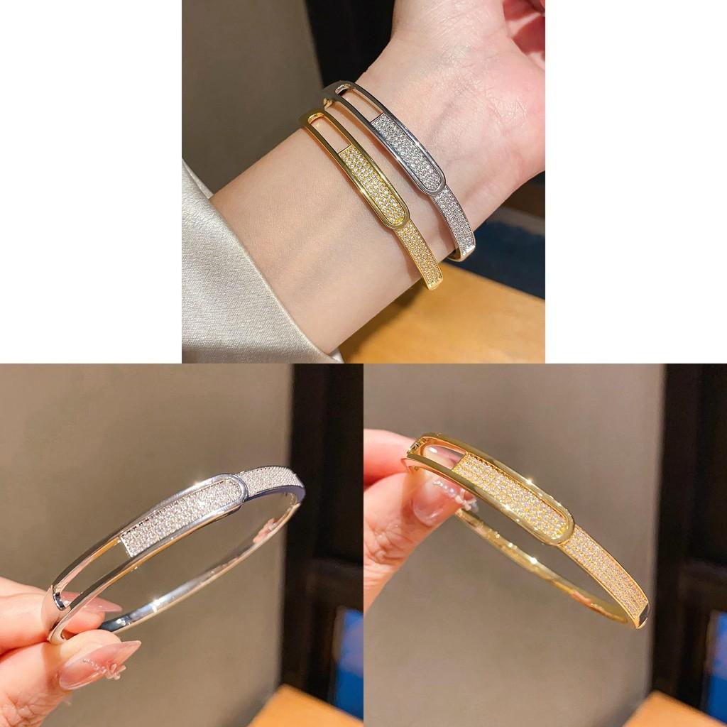 Geometrisches Goldplattiertes Zirkonium Ovales Manschettenarmband Für Modebewusste Frauen