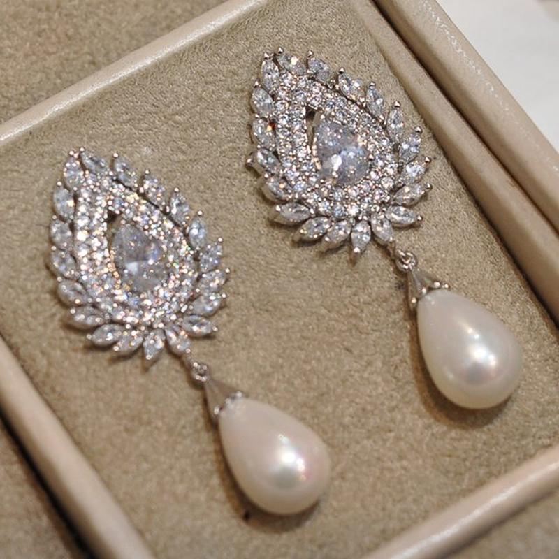 

Huitan Luxury Temperament Women s Imitation Pearl Earrings Full Paved Bling White CZ Stone New Fashion Wedding Zircon Drop Ship