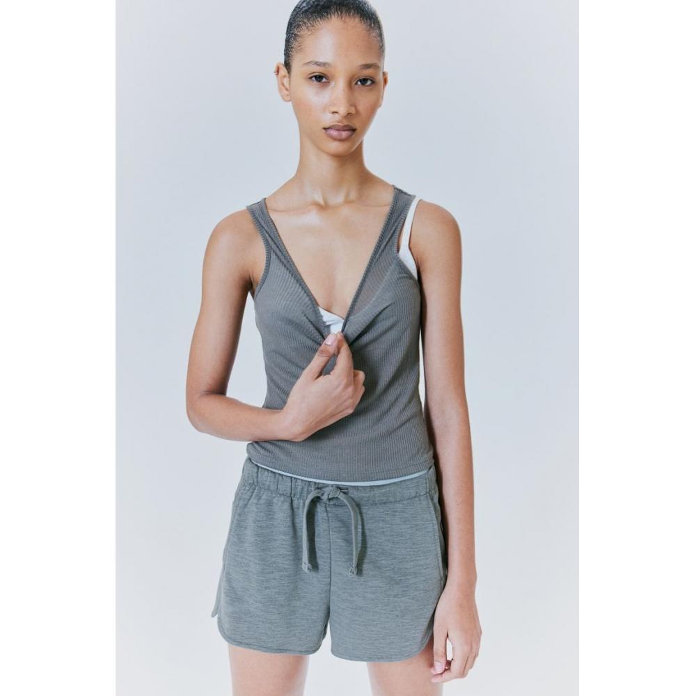 

Топ без рукавов из прозрачной рубчатой ​​ткани HM Темно-пыльно-зеленый