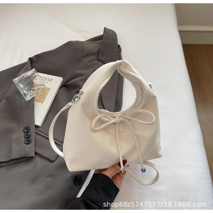 Korean version of simple portable bucket bag women's 2025 new spring and summer fashion shoulder bag versatile commuter crossbody bag