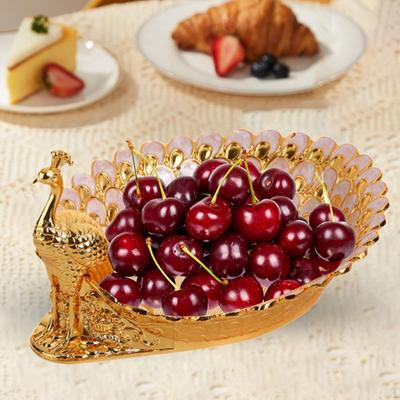 Kompaktes Tablett in Pfauenform für Obst und Trockennahrung in der Küche