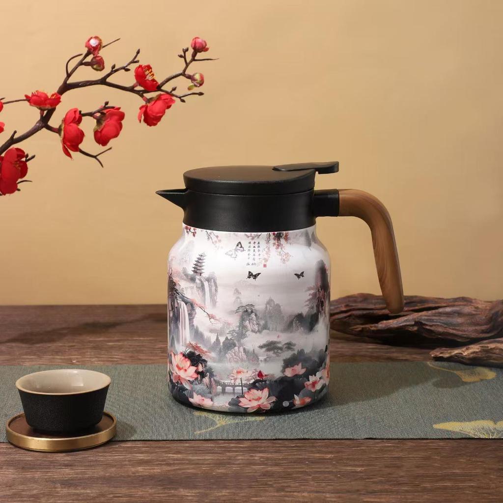 Insulated Stainless Steel Kettle with Tea and Water Separation - Elegant Chinese Style for Home or Office Use.