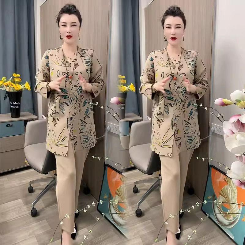 

Женский модный комплект из двух предметов: топ с V-образным вырезом и разрезом и облегающие брюки - Коллекция весна 2025 L (100-115 jin)