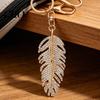 Rhinestones Inlay Keychain Pendant Inlaid Feather Shape Key Chain Hollow Glossy with Anti-Oxidation Lobster Clasp Backpack Bag Accessory Durable Metal