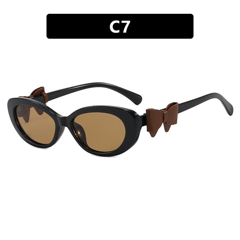 Fashion cat eye sunglasses bow decorative sunglasses women's high-end street photo UV-proof sunglasses
