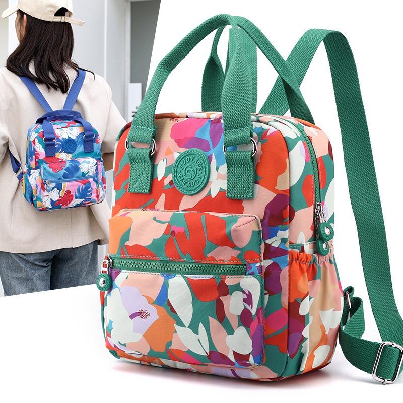 Gedruckter Rucksack für Mütter mittleren Alters, Sommer, neue lässige Pendler-Handtasche, Nylon, modischer Rucksack