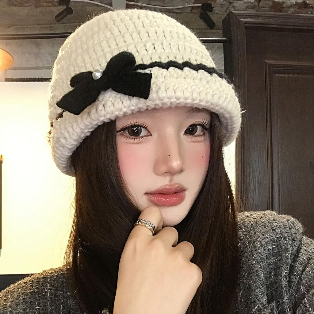 Handwoven bow knitted hat women's autumn and winter warm cold hat show small temperament wool hat
