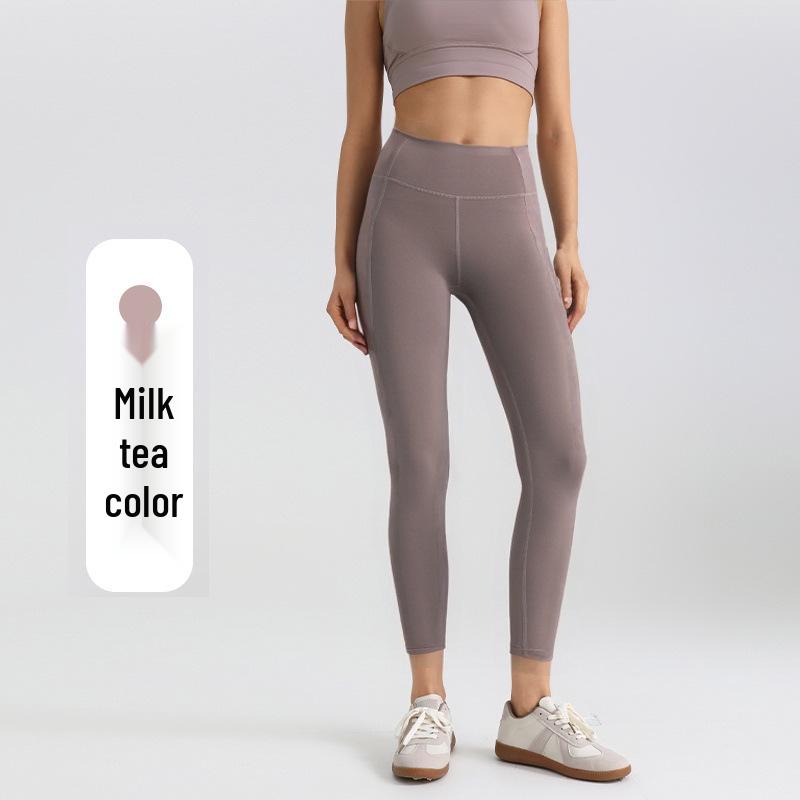 High-Waist Butt-Lift Yoga Pants with Side Pockets - Stretch Athletic Leggings for Women