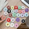Creative Heart-Shaped Airbag Phone Holder & Retractable Desktop Stand for Watching Dramas