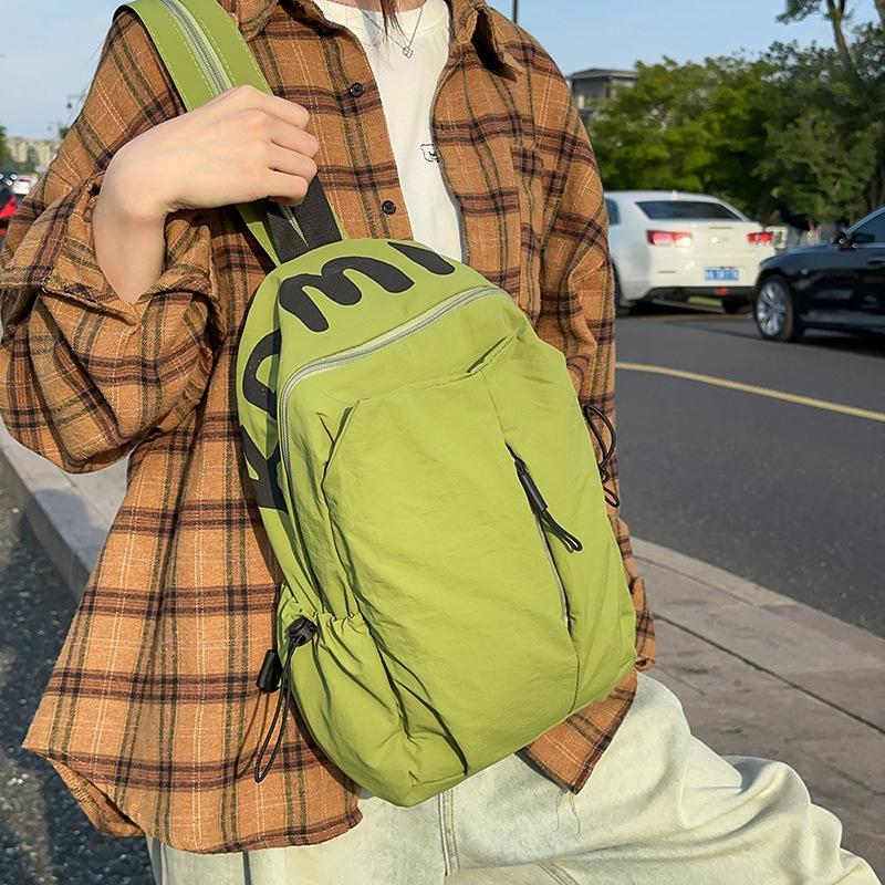 

Solid color simple outdoor style backpack women s design sense niche light schoolbag high-value large-capacity backpack women Large bag світло-жовтого кольору